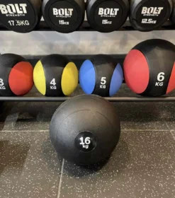 16KG Slamball 10 16KG Slamball -Core Fitness Gear Slam Ball in front of ball rack